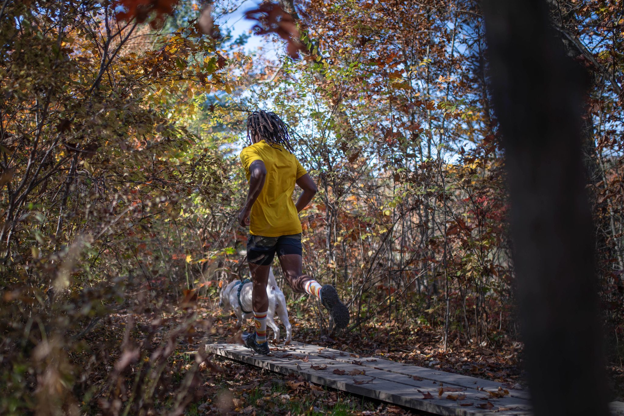 Stride for stride, they disappear down the trail.