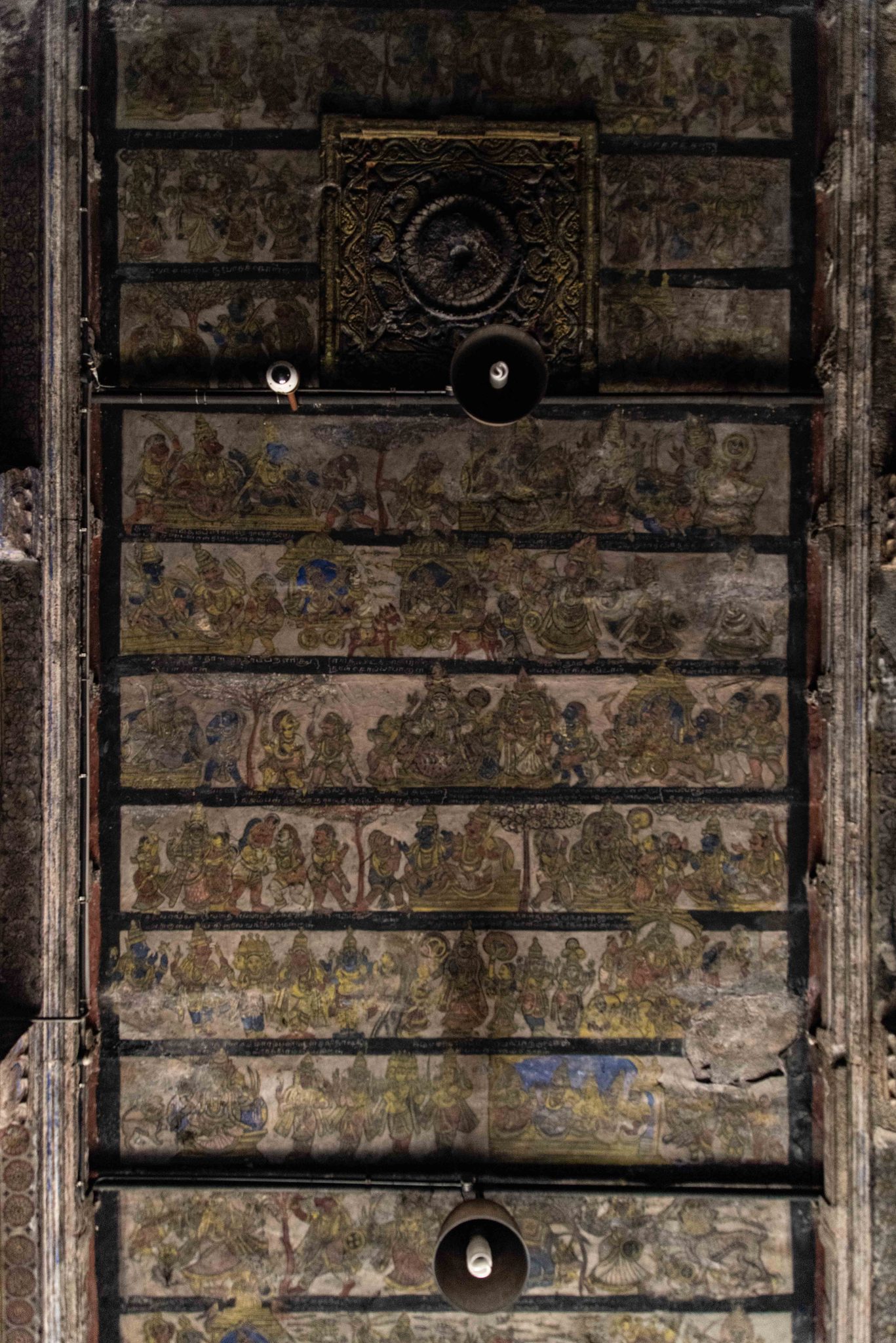 An old carved door studded with worn metal plates.