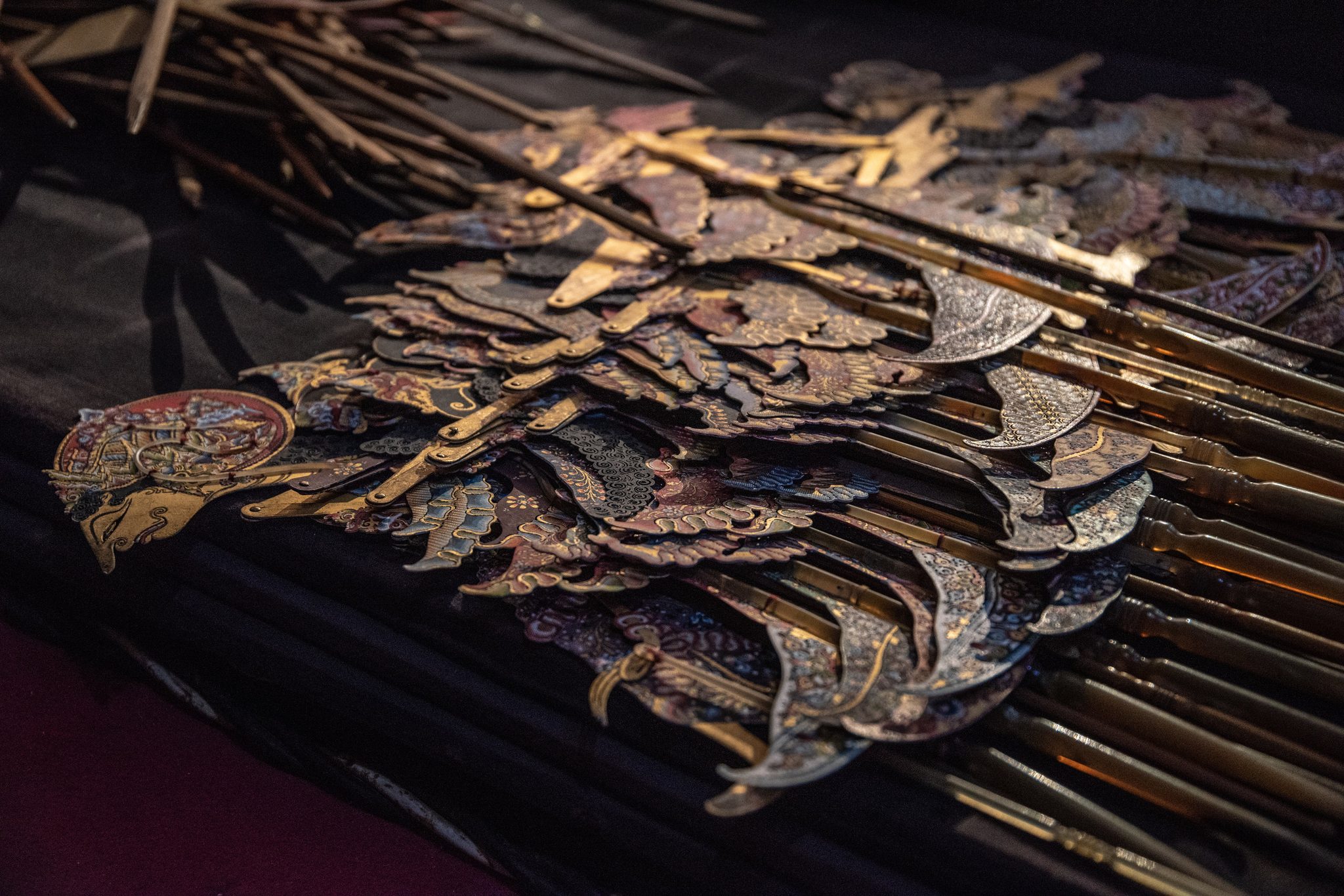 An array of shadow puppets strategically laid out