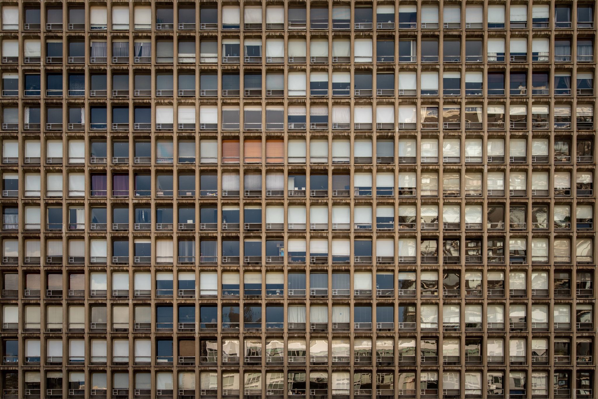 Hundreds of windows, each one a life we will never see. If we could see into each other's windows, we'd realize that we are more alike than we are different.
