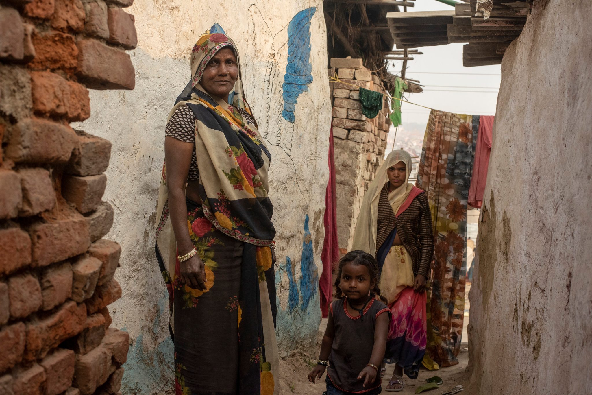 Vimla, age 60, has lived on the outskirts of the mela with her children and grand children for 3 generations.