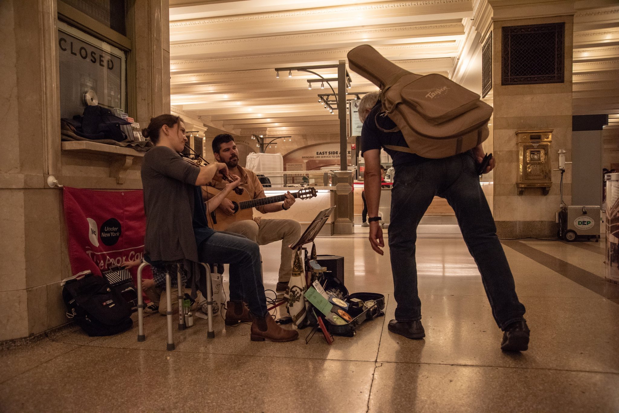 Busking means they are only paid what they earn from tips and CD sales.