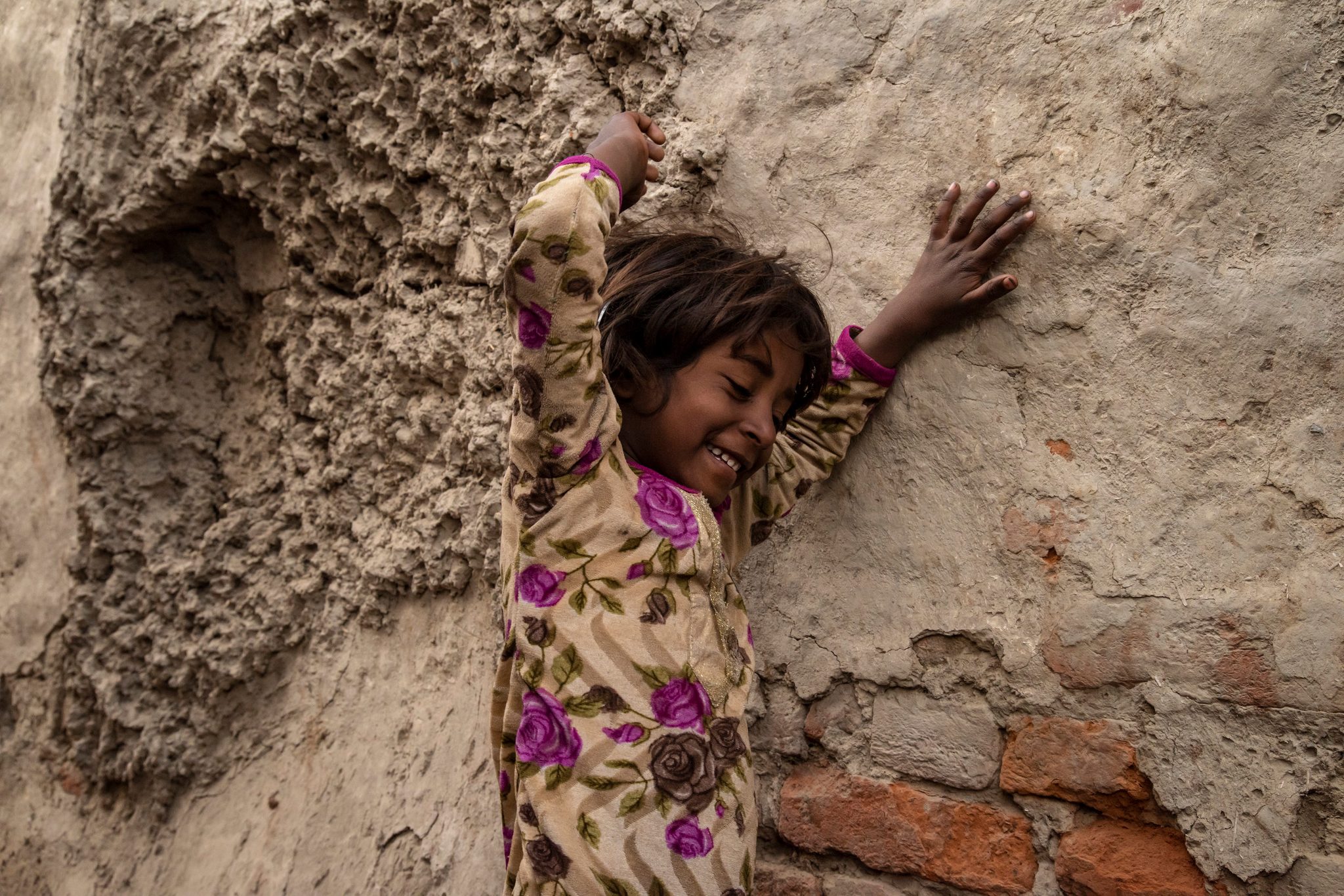 Young girl who lives on the outskirt of the mela