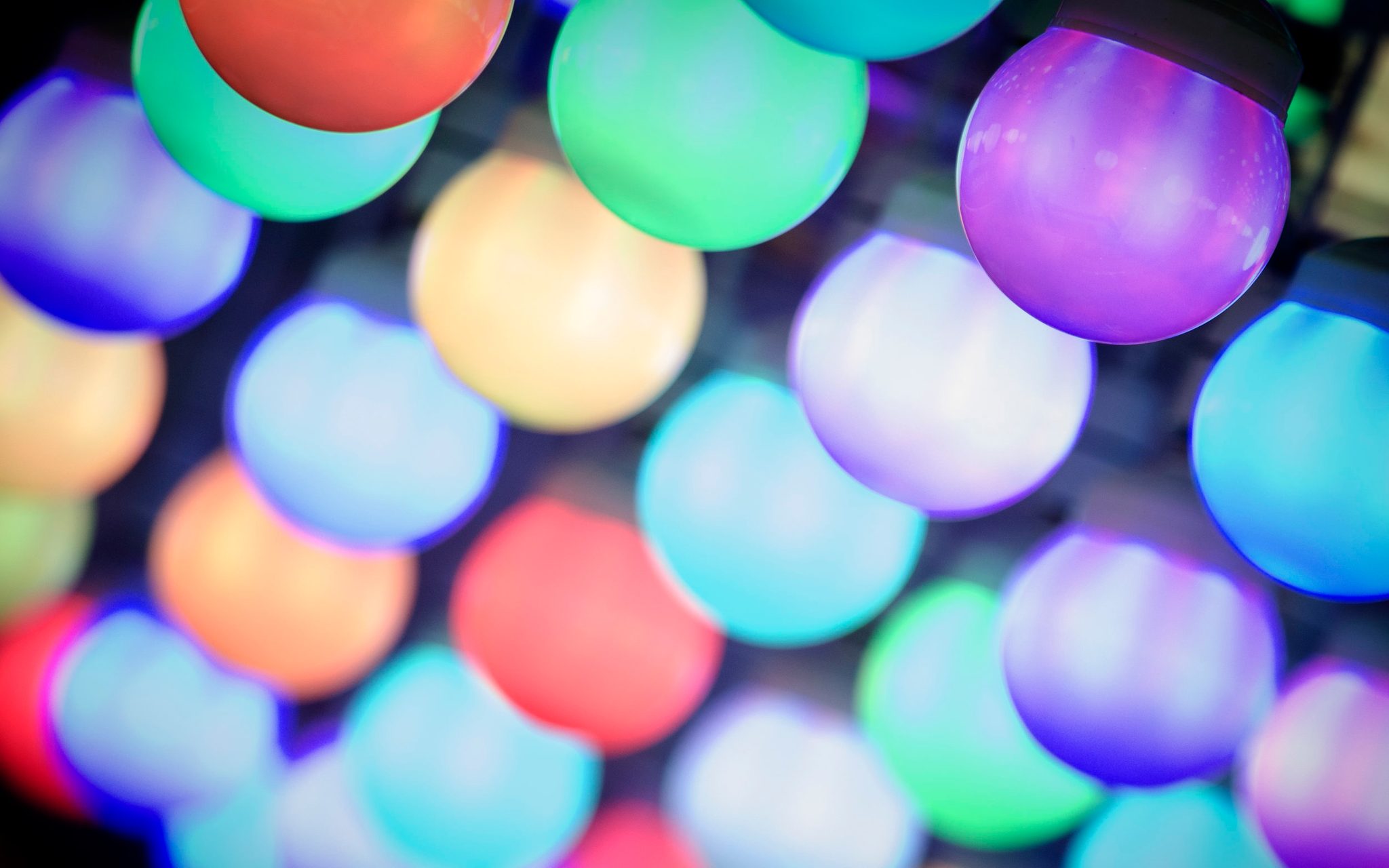 Colored bulbs blur into soft orbs of light.